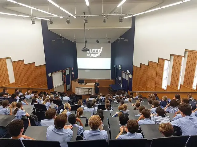 Simple Six presentation in a school hall