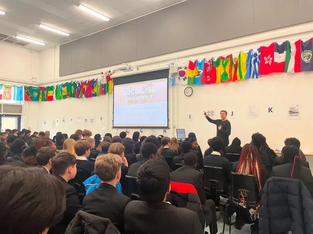 James presenting to a sixth form cohort